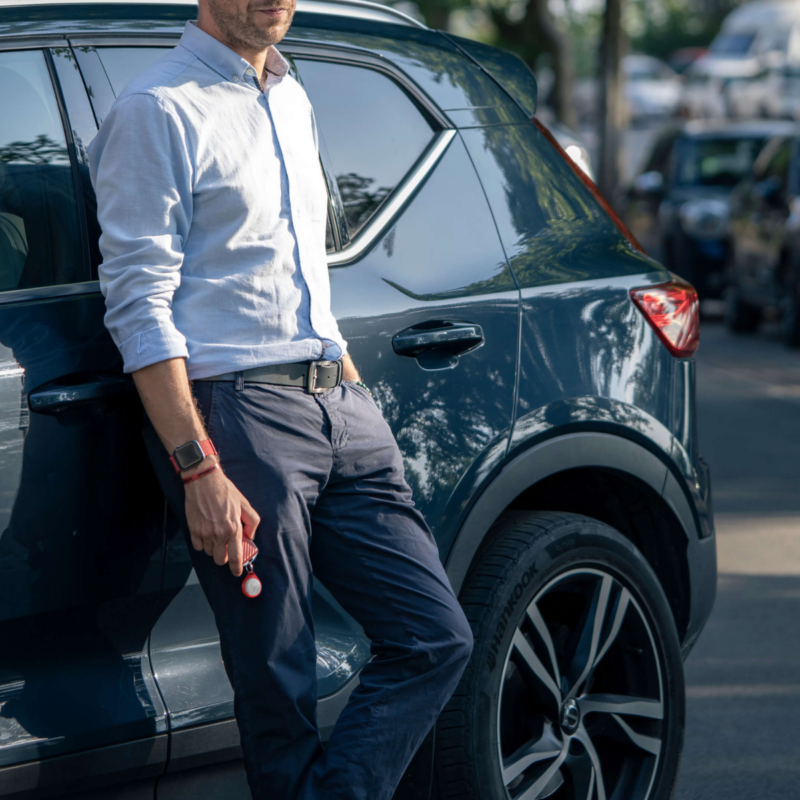 photo about a man in front of his car protected by Trackting SMART V3 Antitheft GPS device